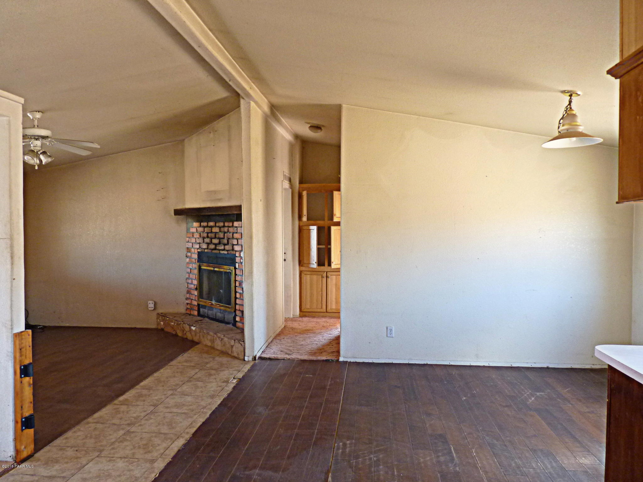 1155 North Rabbit Ridge Road Dewey, AZ 86327 - Photo 11 of 36 Formal Dining Room_View from Kitchen