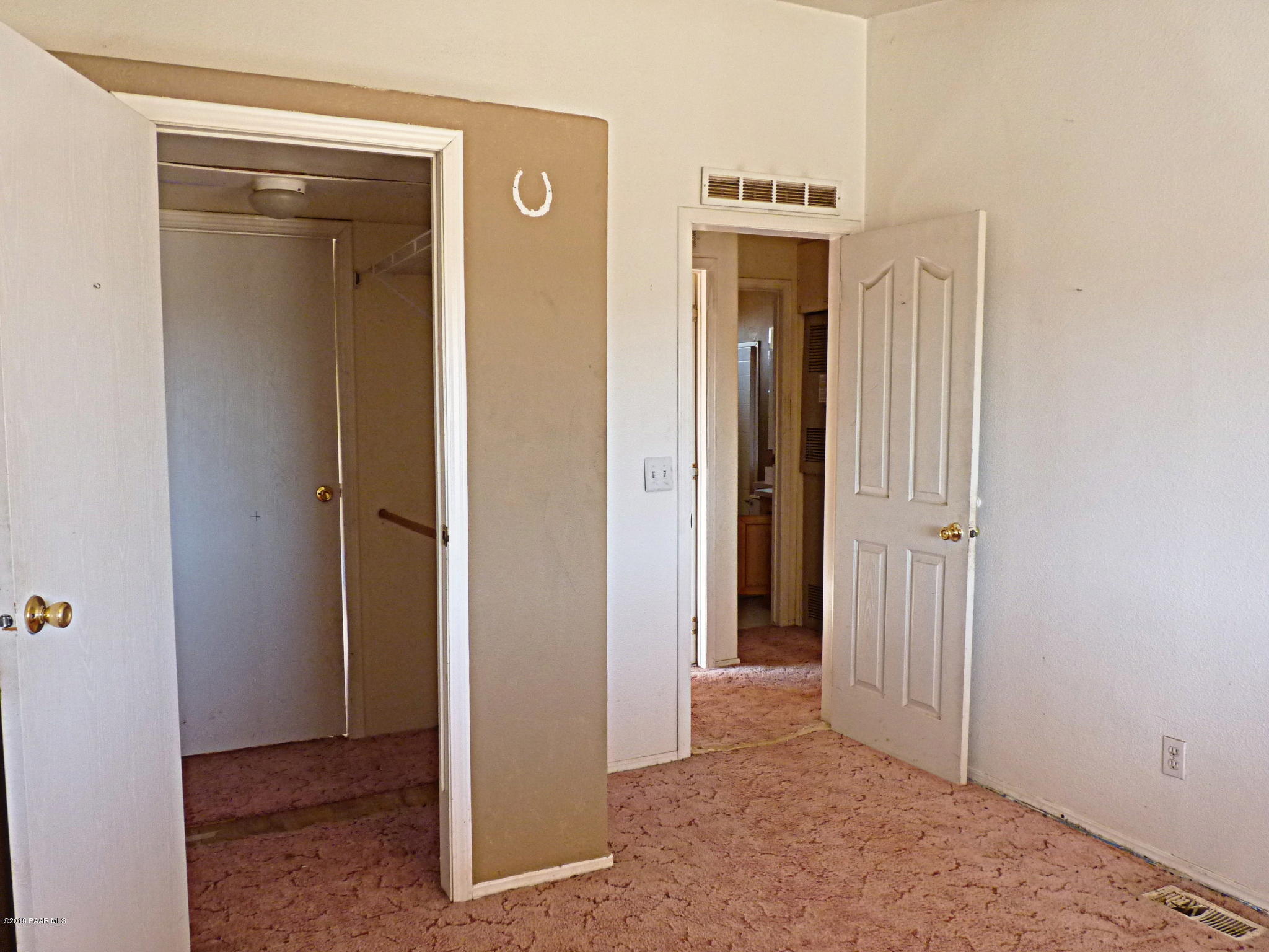 1155 North Rabbit Ridge Road Dewey, AZ 86327 - Photo 6 of 36 Bedroom 3 view towards jack and jill clo