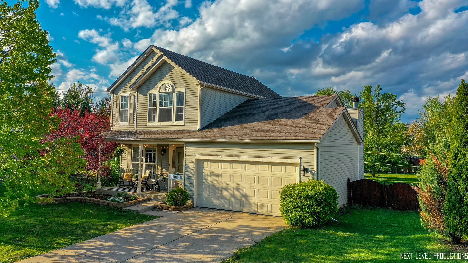 1916 Prairie Ridge Court Plainfield, IL 60586 - Photo 1 of 31 a front view of a house with a yard and garage