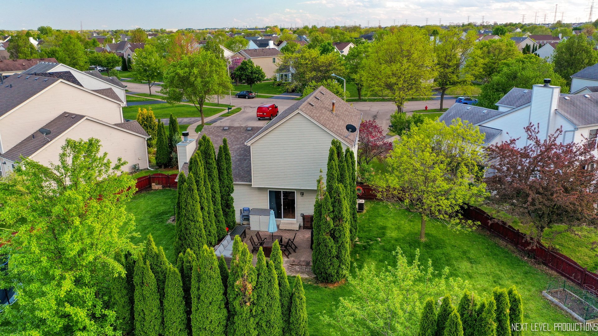 1916 Prairie Ridge Court Plainfield, IL 60586 - Photo 11 of 31 a view of a garden with plants and large trees