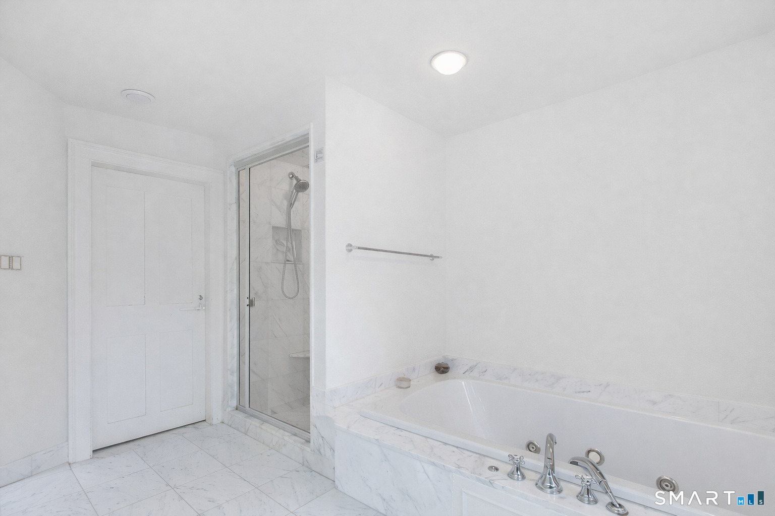 71 Beecher Road Woodbridge, CT 06525 - Photo 20 of 32 a bathroom with a bathtub and a sink
