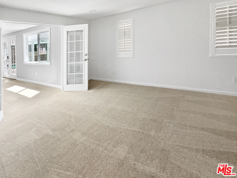 17530 Devonshire Street Northridge, CA 91325 - Photo 27 of 39 an empty room with windows