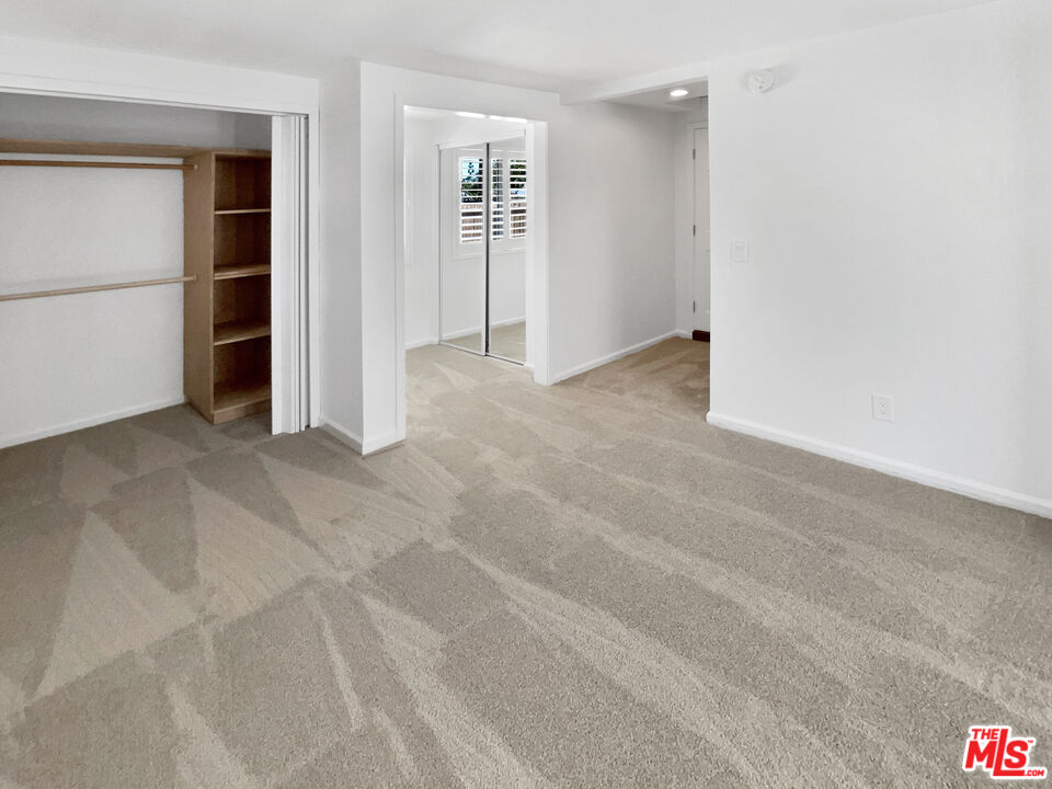 17530 Devonshire Street Northridge, CA 91325 - Photo 29 of 39 an empty room with closet