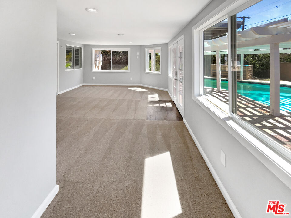 17530 Devonshire Street Northridge, CA 91325 - Photo 30 of 39 a view of a house with a large window