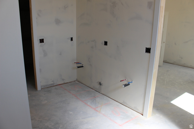 4933 East Remington Road Cedar City, UT 84721 - Photo 20 of 33 Unfinished interior space with drywall walls, exposed plumbing, and electrical rough-ins
