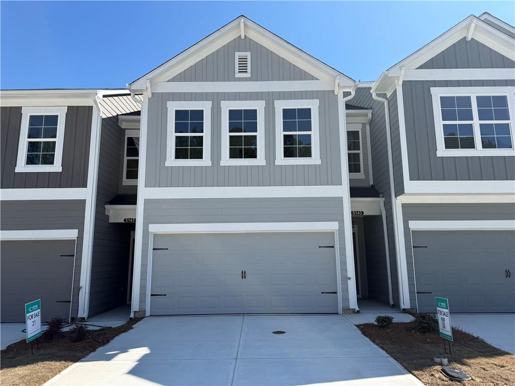 5143 Longview Run Decatur, GA 30035 - Photo 1 of 17 a front view of a house with a garage