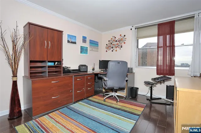 a workspace with furniture and window