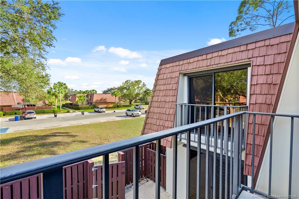2930 Southwest Sunset Trace Circle Palm City, FL 34990 - Photo 22 of 31 a view of a balcony with city view