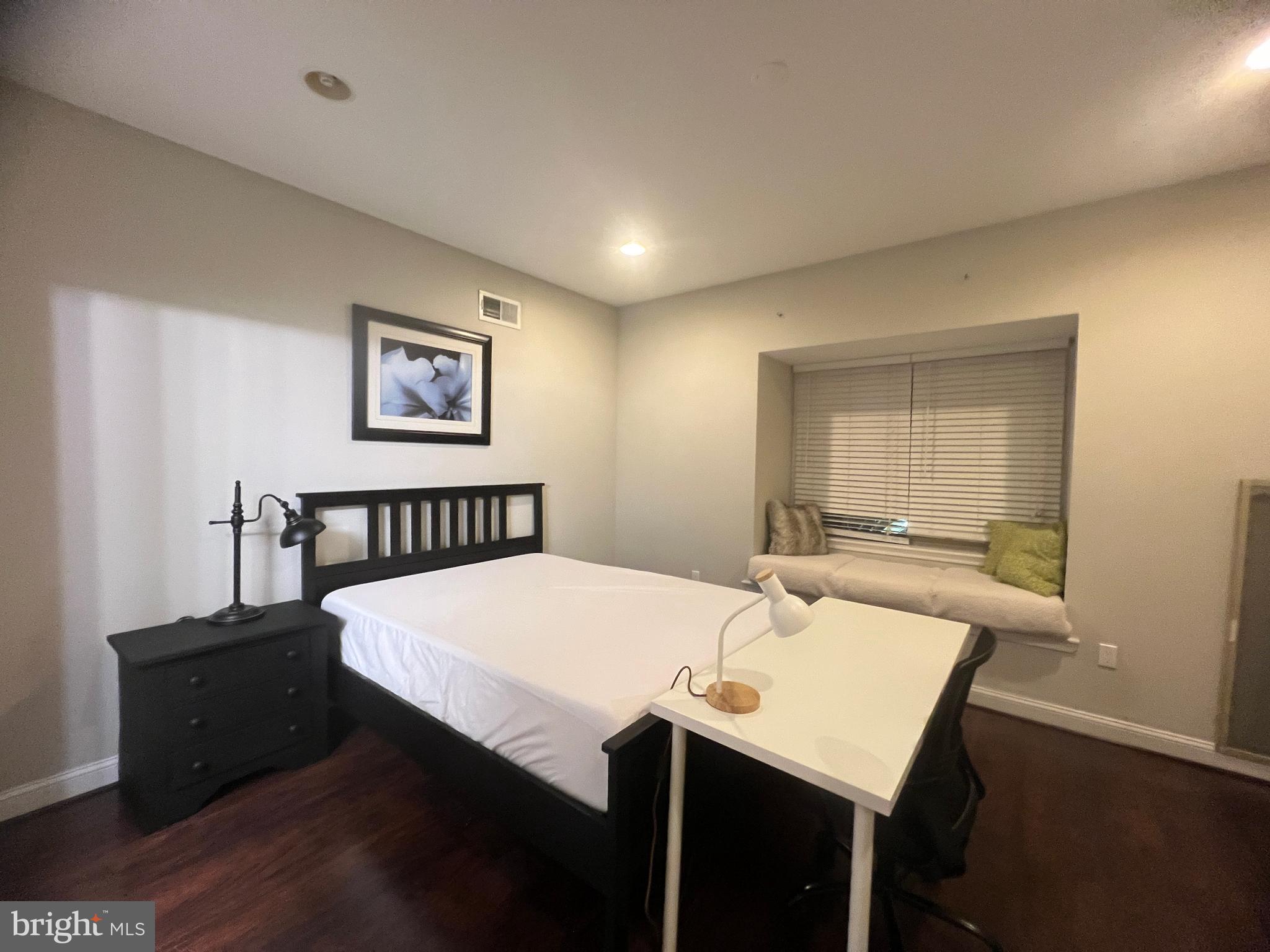 3802 Spring Garden Street Philadelphia, PA 19104 - Photo 22 of 26 a view of a dining room with furniture and wooden floor