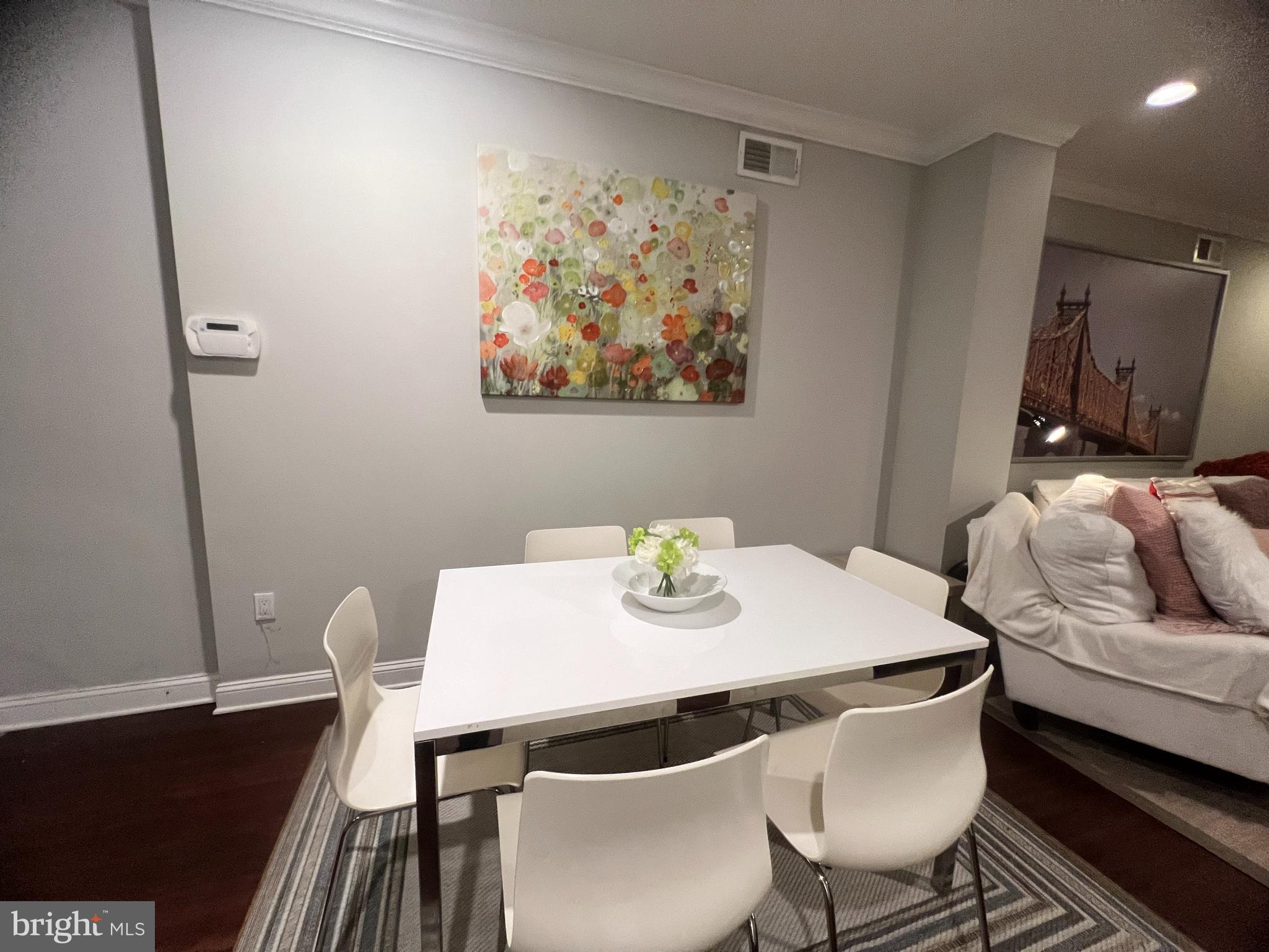3802 Spring Garden Street Philadelphia, PA 19104 - Photo 7 of 26 a view of a dining room with furniture and wooden floor
