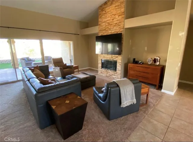 a bedroom with a bed and lamp