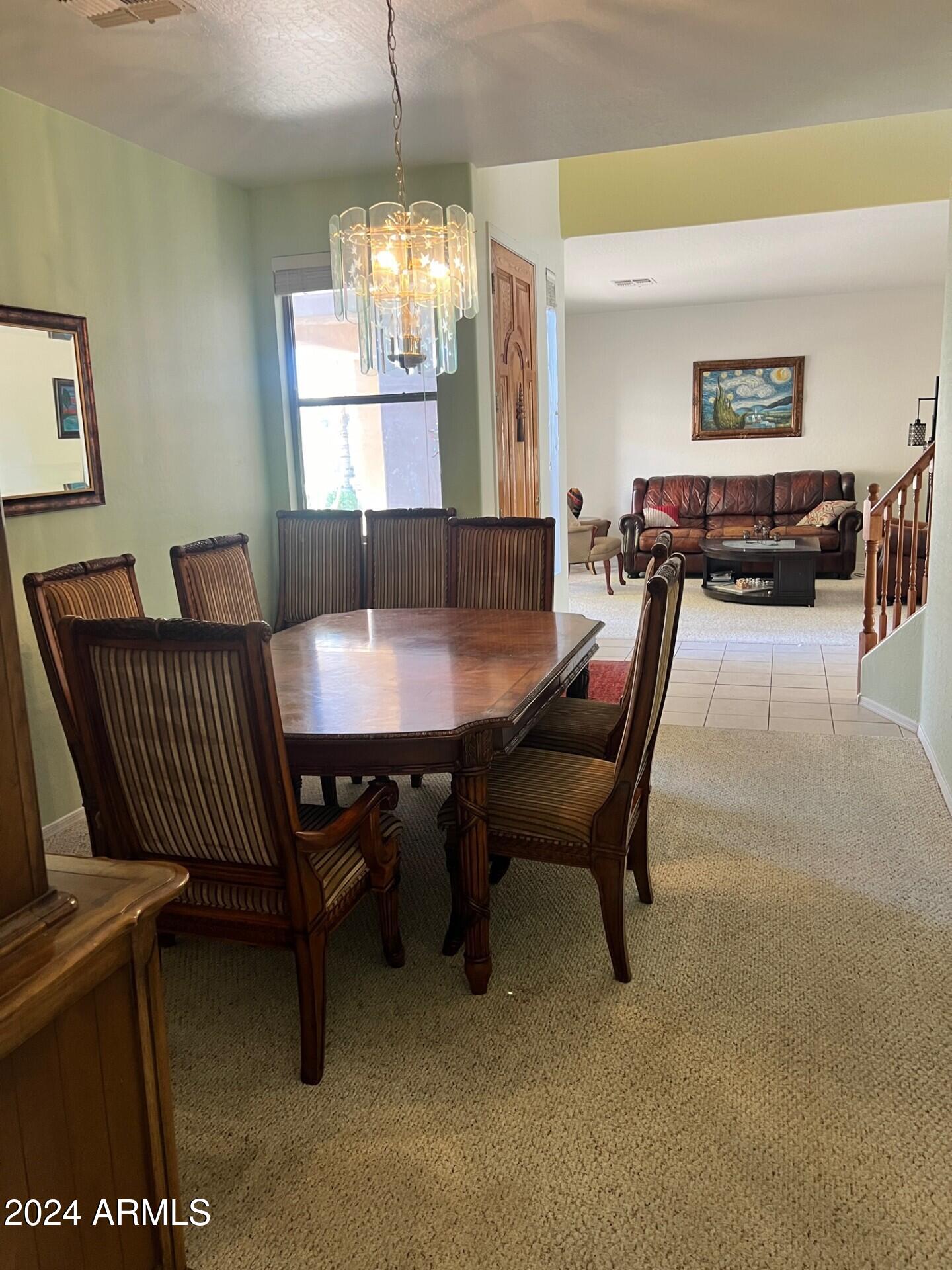 2081 East Desert Inn Drive Chandler, AZ 85249 - Photo 11 of 49 a view of a dining room with furniture