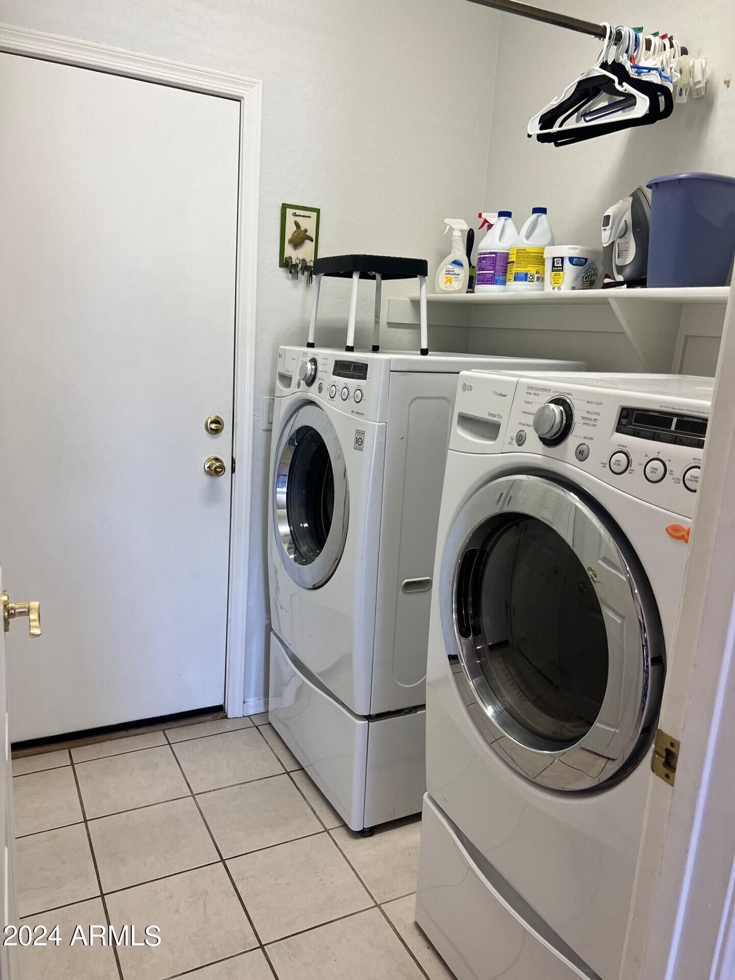 2081 East Desert Inn Drive Chandler, AZ 85249 - Photo 12 of 49 a utility room with dryer and washer