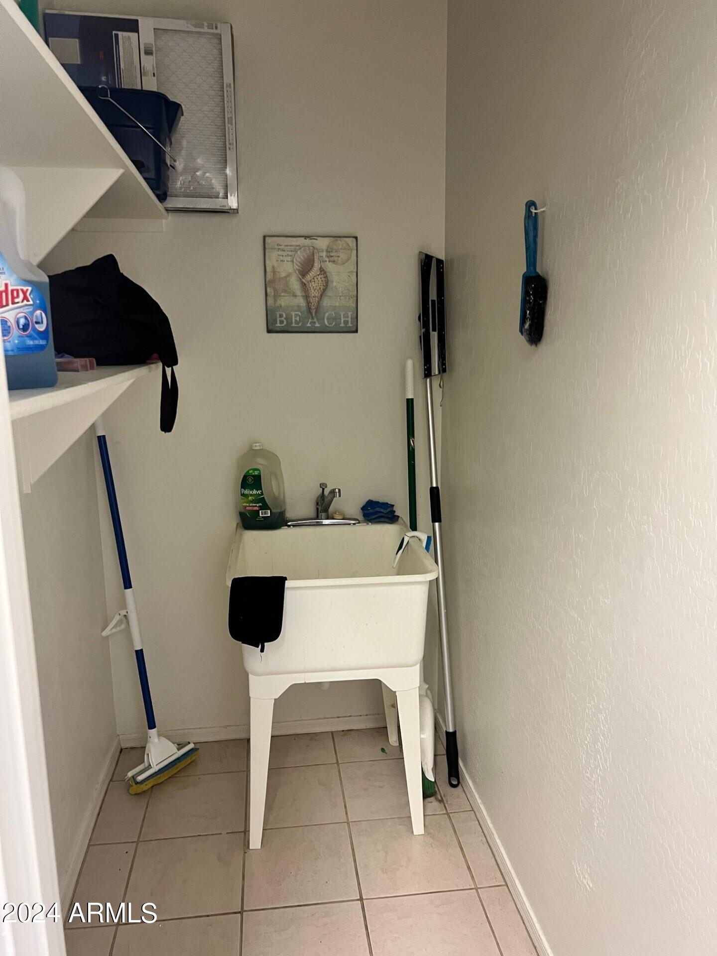 2081 East Desert Inn Drive Chandler, AZ 85249 - Photo 13 of 49 a bathroom with a toilet and a sink