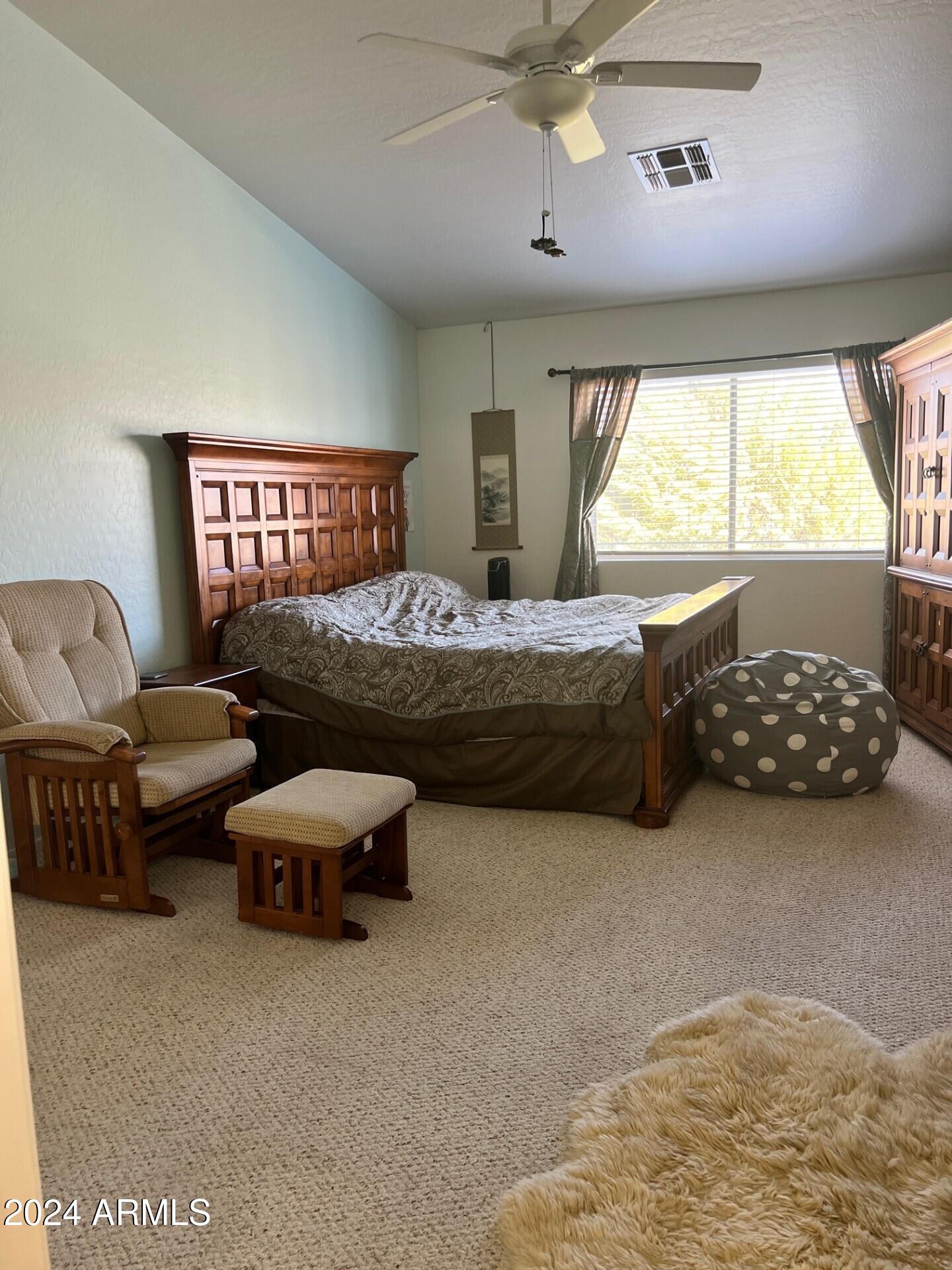 2081 East Desert Inn Drive Chandler, AZ 85249 - Photo 20 of 49 a bedroom with bed and window