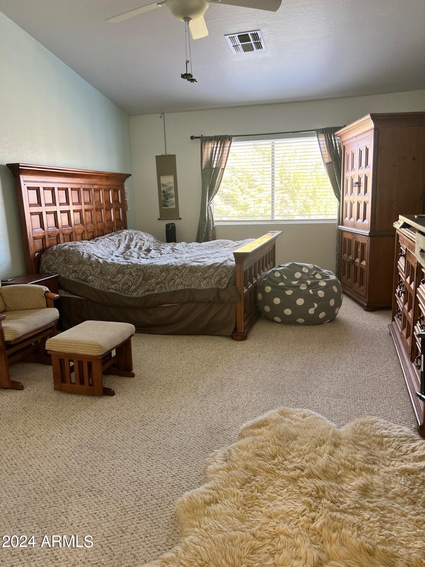 2081 East Desert Inn Drive Chandler, AZ 85249 - Photo 21 of 49 a bedroom with furniture and a large window