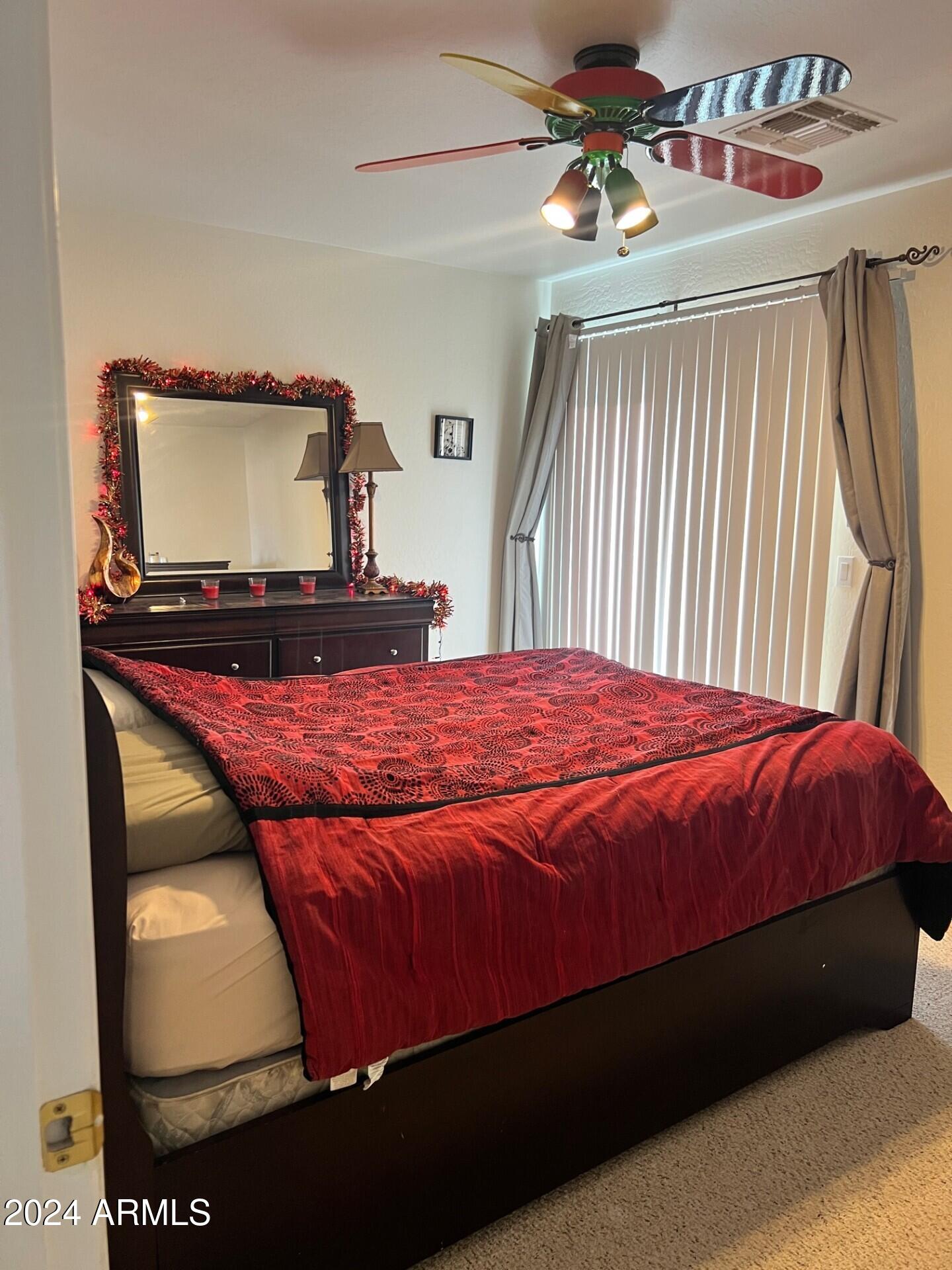 2081 East Desert Inn Drive Chandler, AZ 85249 - Photo 25 of 49 a bedroom with a bed and window