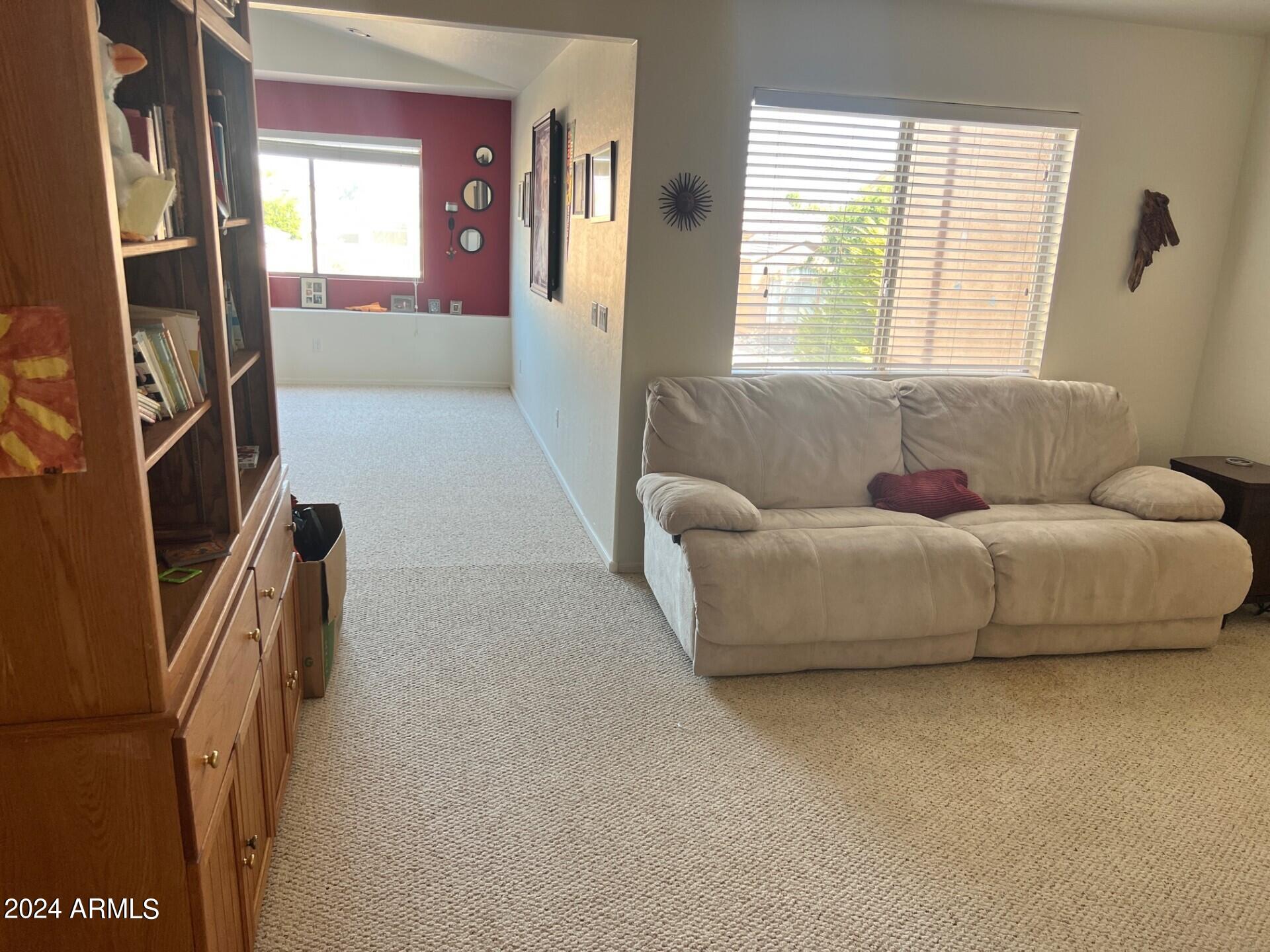 2081 East Desert Inn Drive Chandler, AZ 85249 - Photo 35 of 49 a living room with furniture and a window