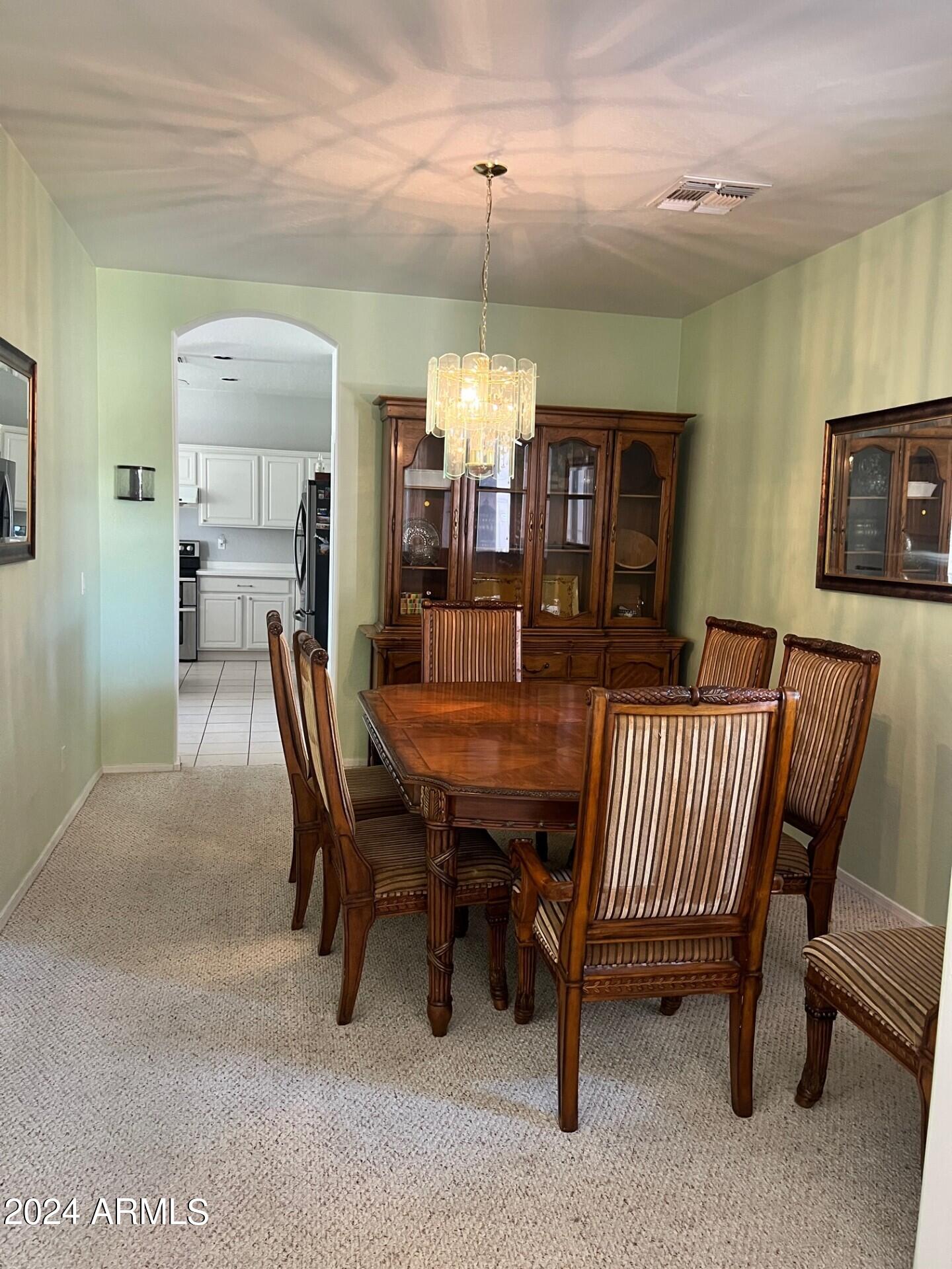 2081 East Desert Inn Drive Chandler, AZ 85249 - Photo 10 of 49 a view of a dining room with furniture