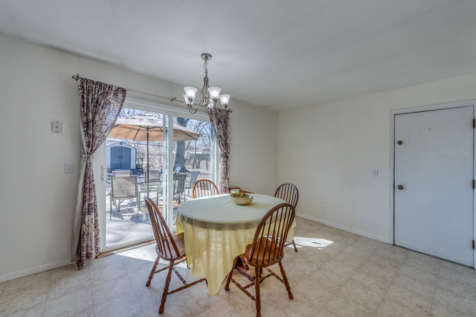 14 Pomeroy Road Montgomery, IL 60538 - Photo 11 of 19 a dining room with furniture and chandelier