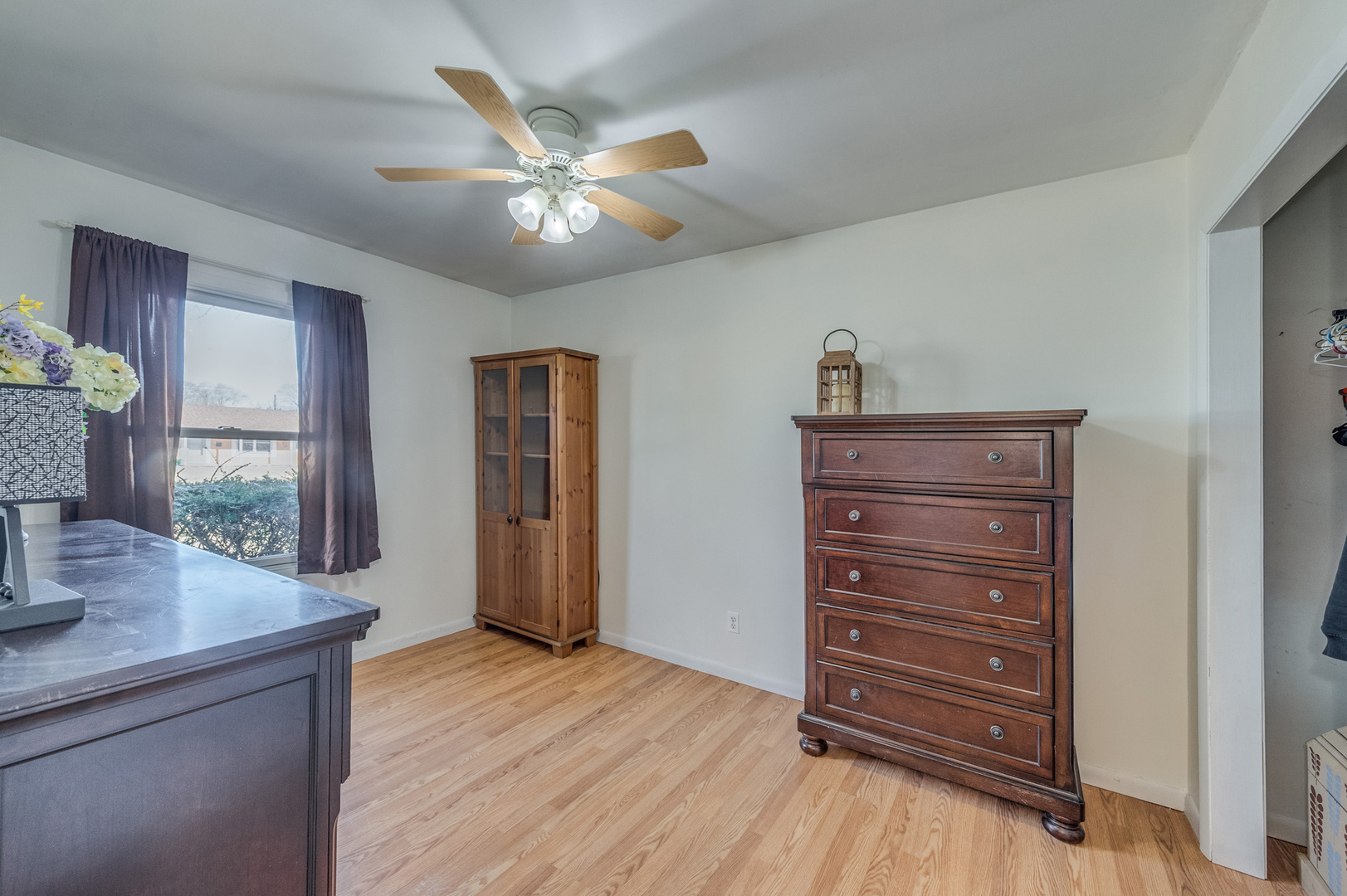14 Pomeroy Road Montgomery, IL 60538 - Photo 15 of 19 a view of a livingroom with a furniture wooden floor and window