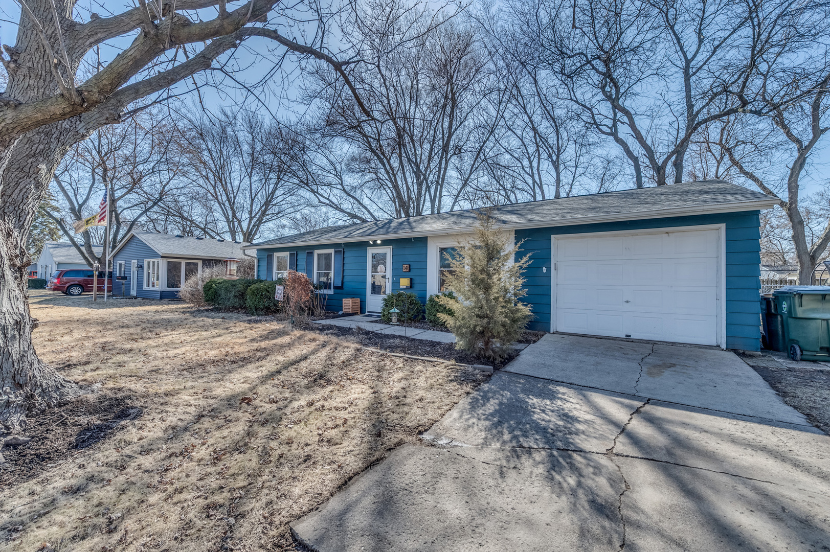 14 Pomeroy Road Montgomery, IL 60538 - Photo 3 of 19 a front view of a house with a yard and garage