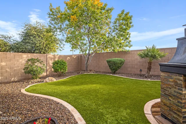a view of a bench in front of house