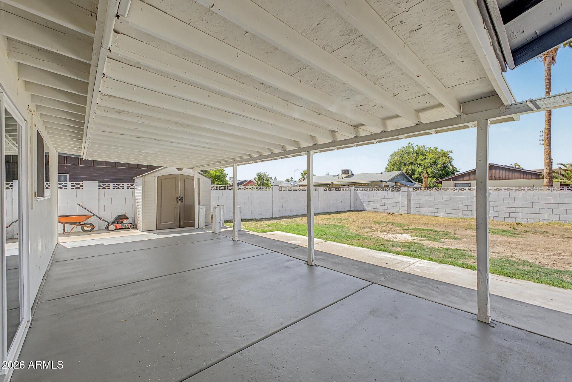 5232 West Hearn Road Glendale, AZ 85306 - Photo 22 of 32 a view of an empty room with sliding glass door