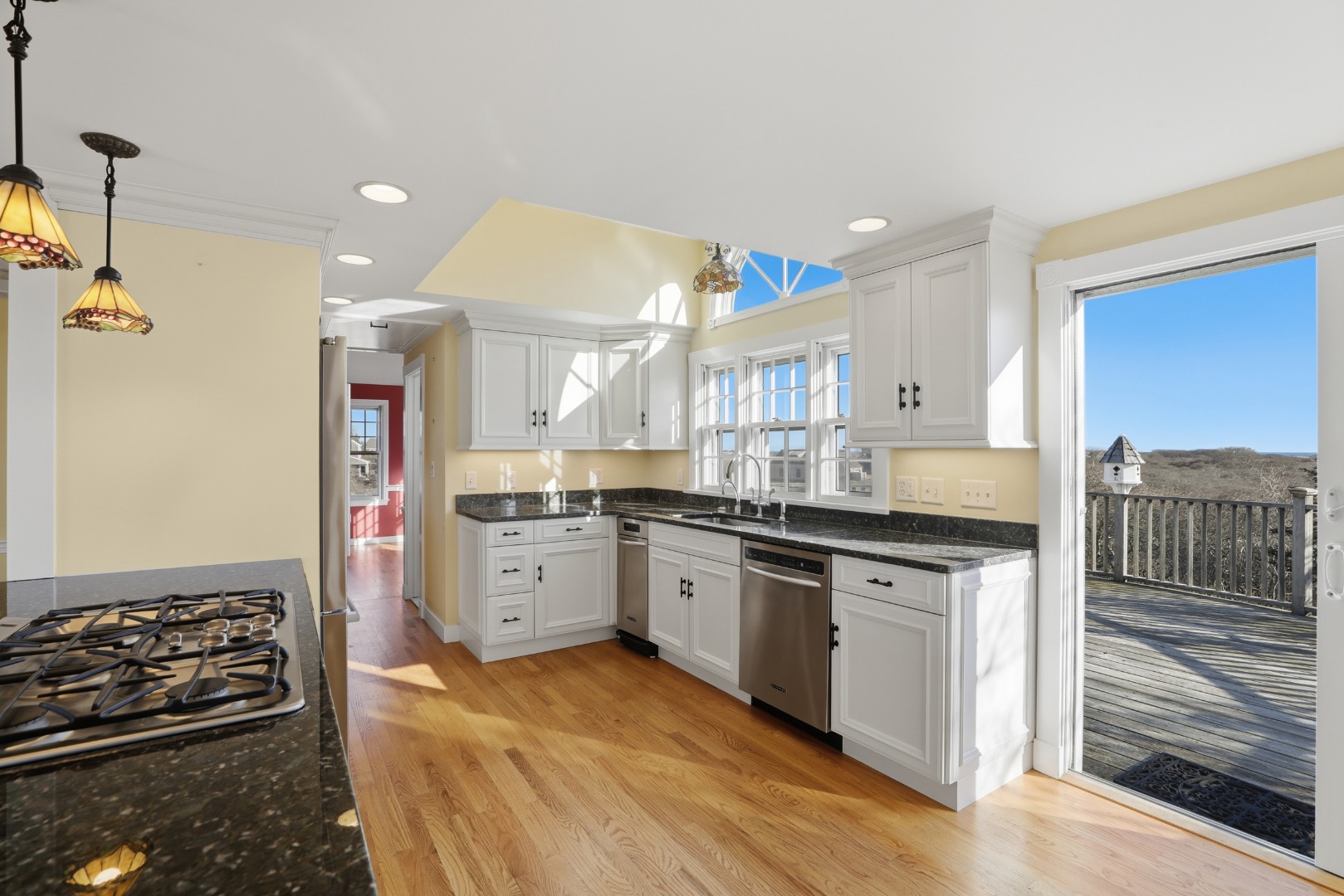 31 Flintlock Road Nantucket, MA 02554 - Photo 8 of 23 a large kitchen with stainless steel appliances granite countertop a stove and a sink