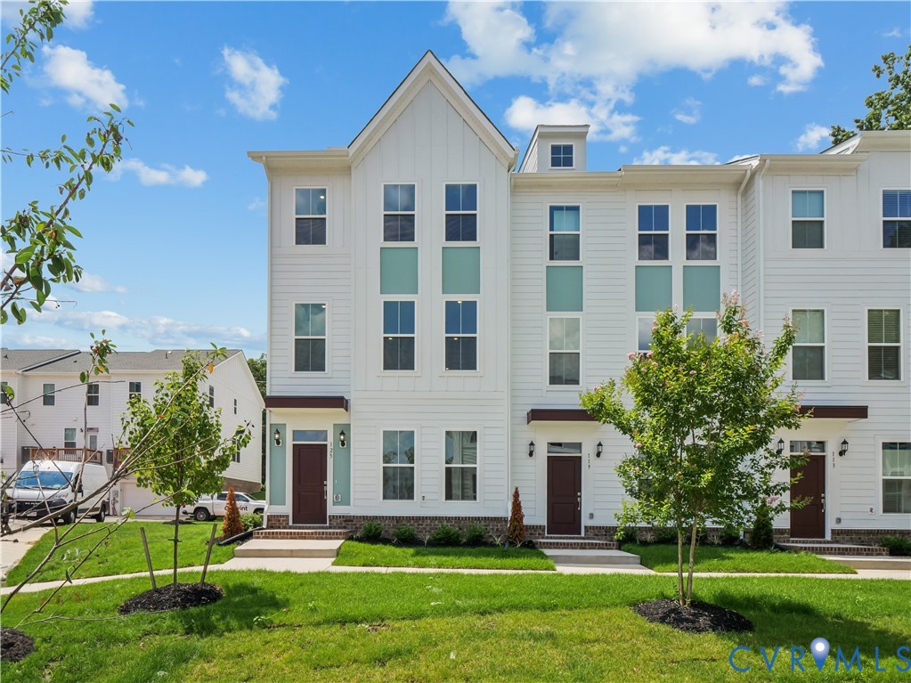 127 This Way Midlothian, VA 23114 - Photo 1 of 1 a front view of a house with a yard and trees