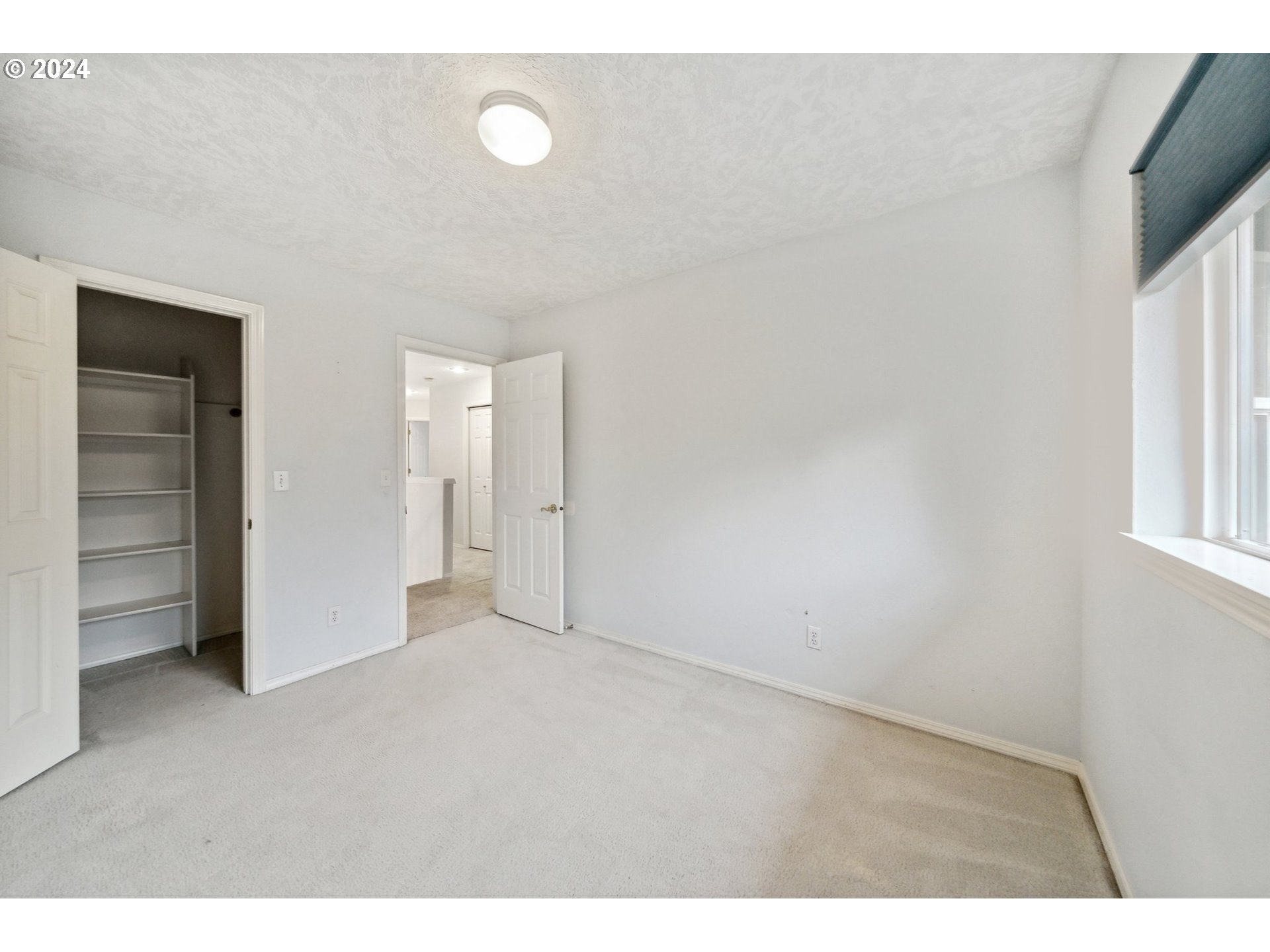 527 Southwest 27th Way Troutdale, OR 97060 - Photo 30 of 41 a view of an empty room with a window