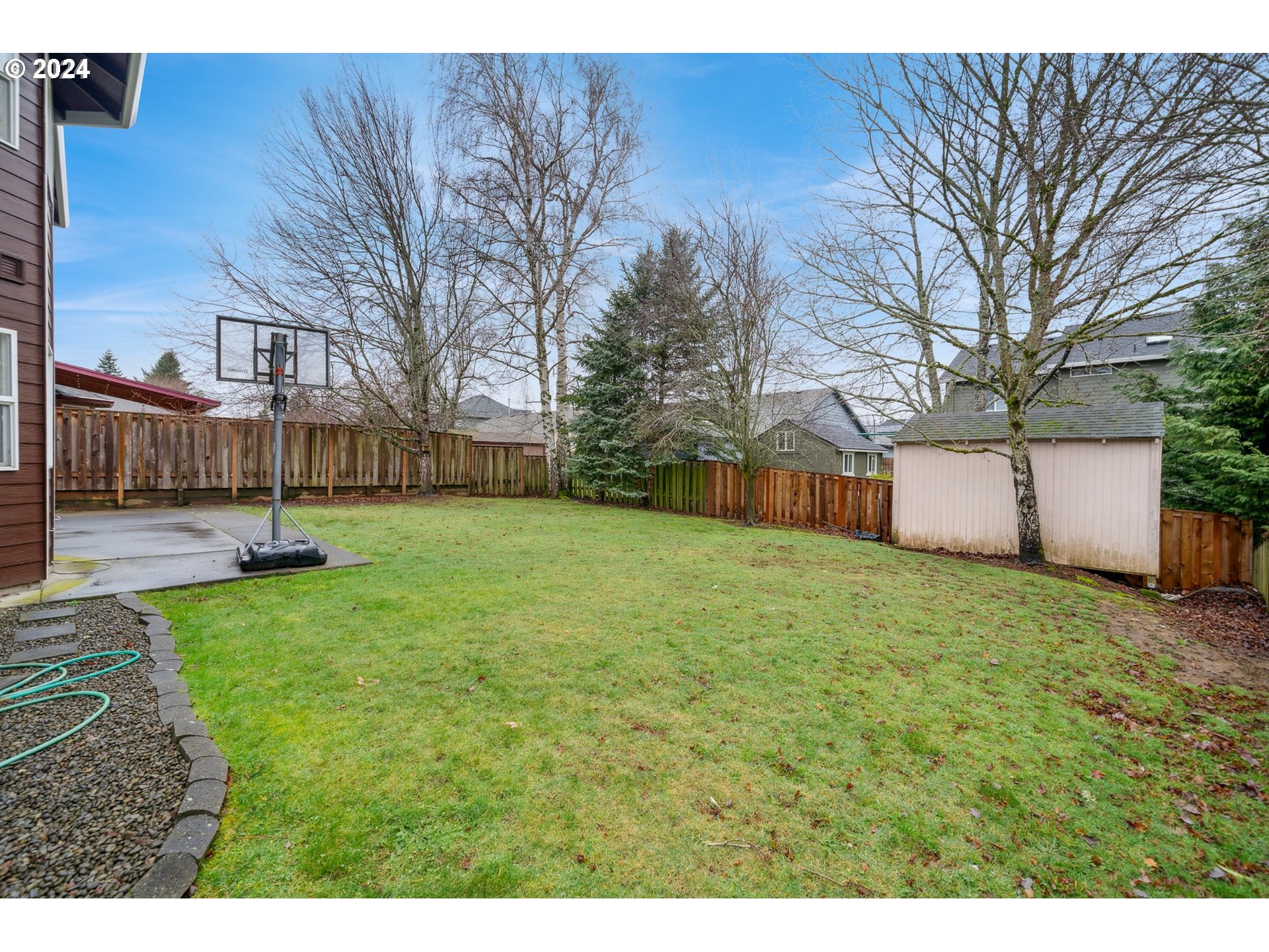 527 Southwest 27th Way Troutdale, OR 97060 - Photo 40 of 41 a view of a backyard with large trees