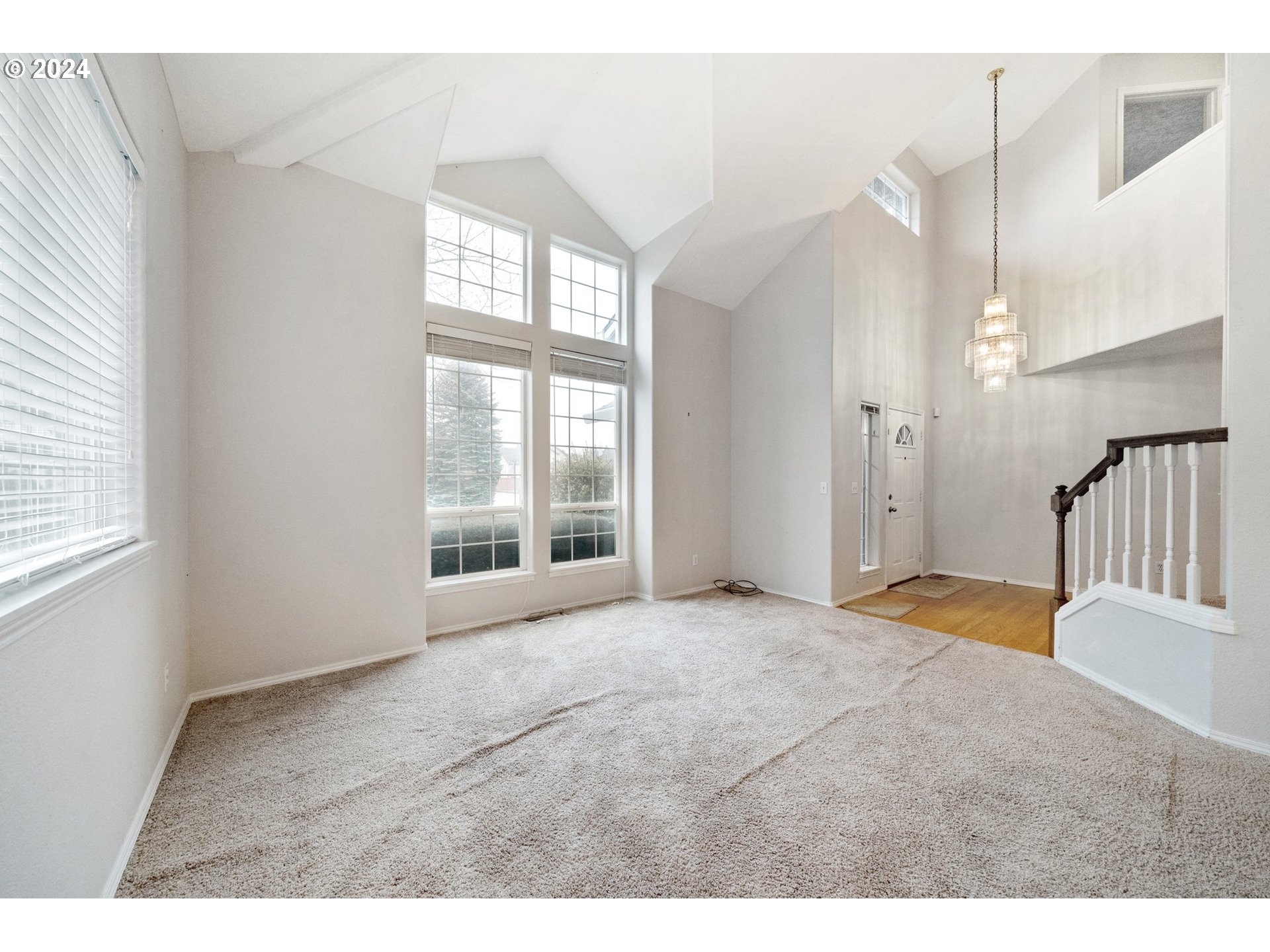527 Southwest 27th Way Troutdale, OR 97060 - Photo 4 of 41 a view of an empty room with a window