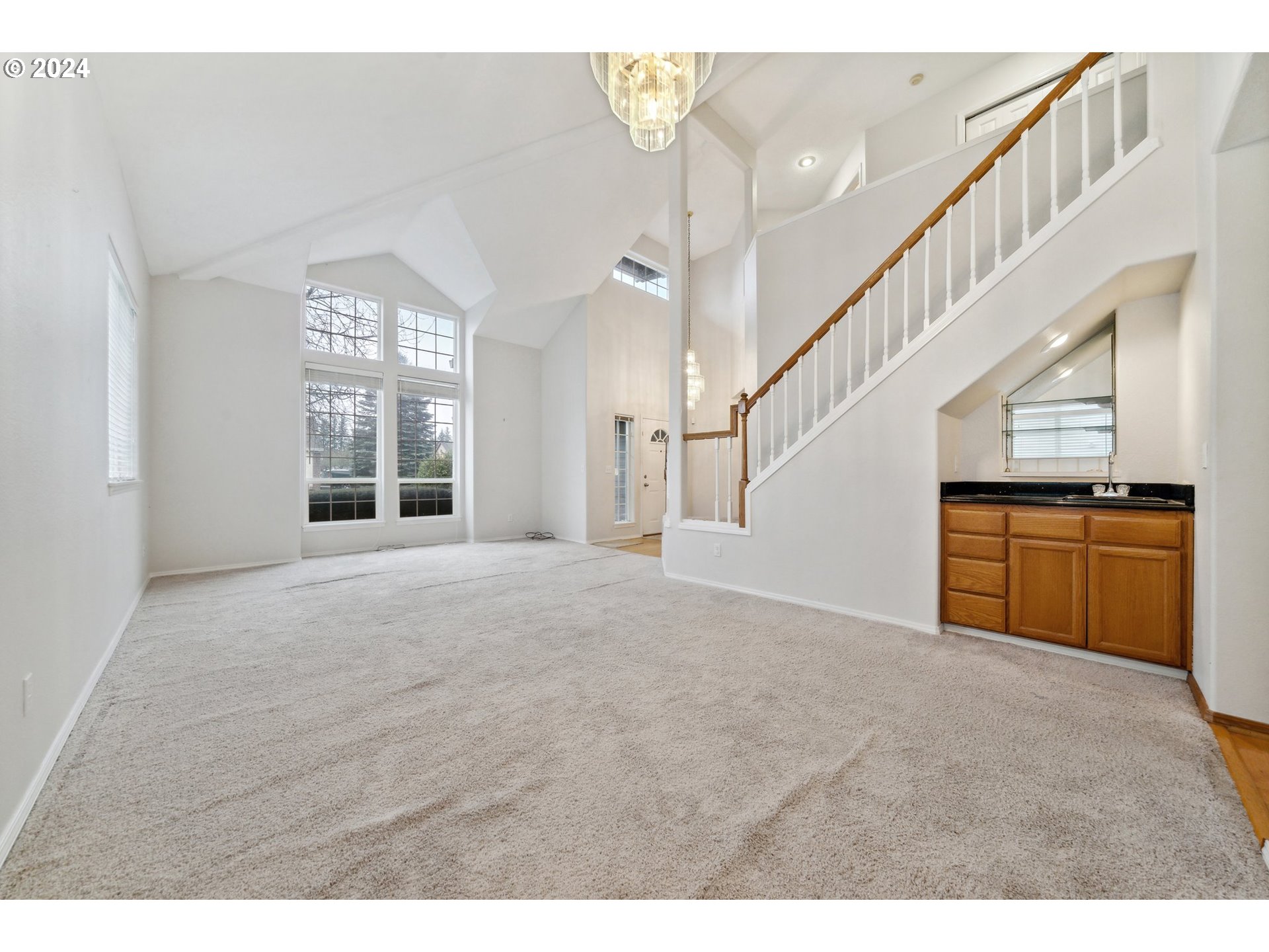 527 Southwest 27th Way Troutdale, OR 97060 - Photo 5 of 41 a view of an empty room and window