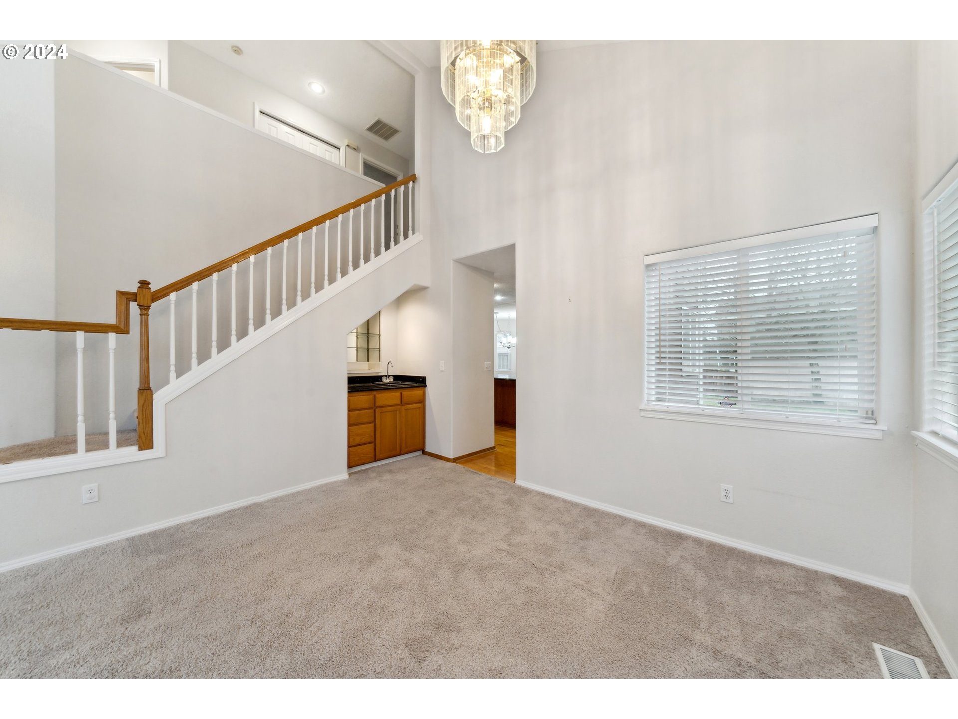 527 Southwest 27th Way Troutdale, OR 97060 - Photo 6 of 41 a view of an empty room with stairs