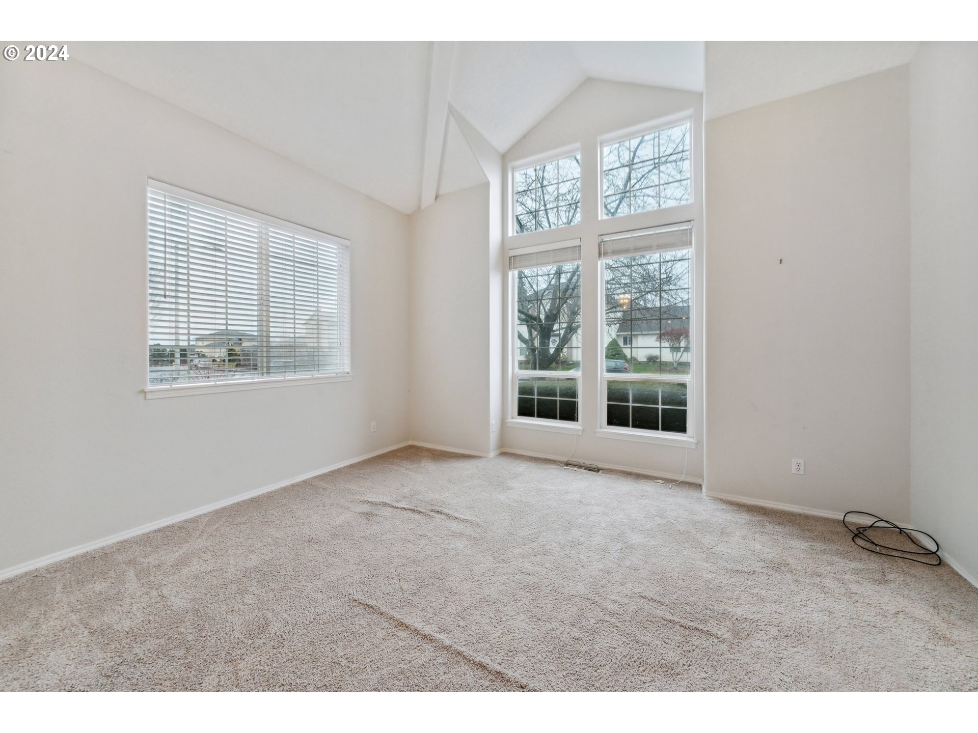 527 Southwest 27th Way Troutdale, OR 97060 - Photo 9 of 41 a view of an empty room with a window