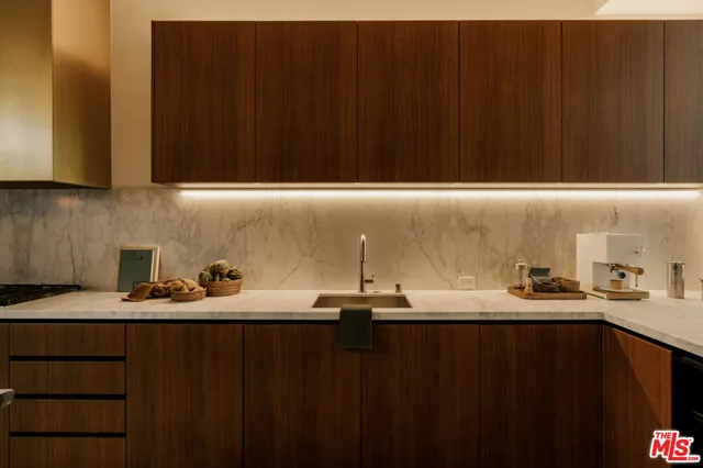 a kitchen with a sink and a cabinets