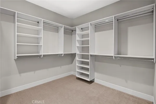 a view of an empty walk in closet