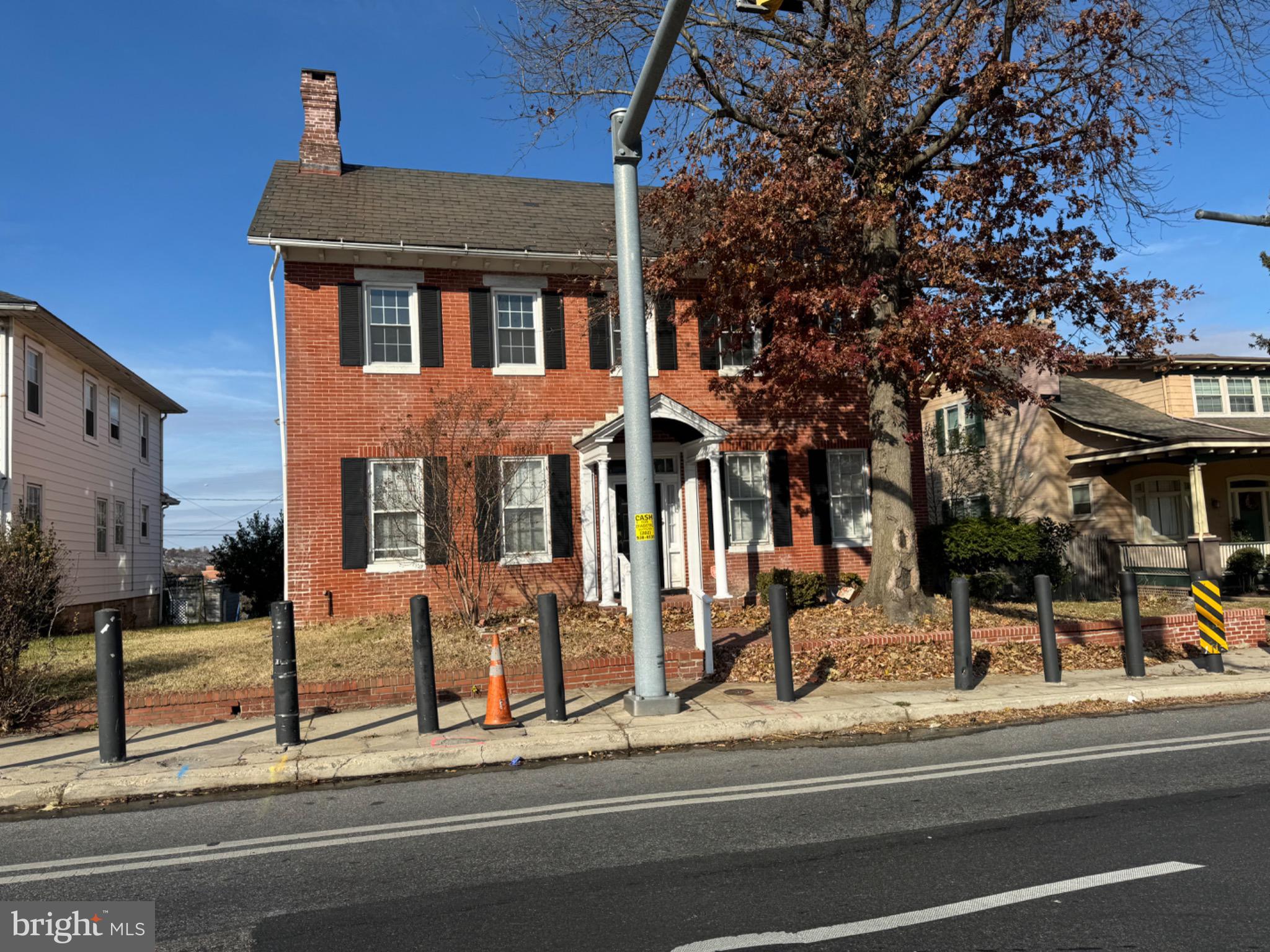a view of a building with a street