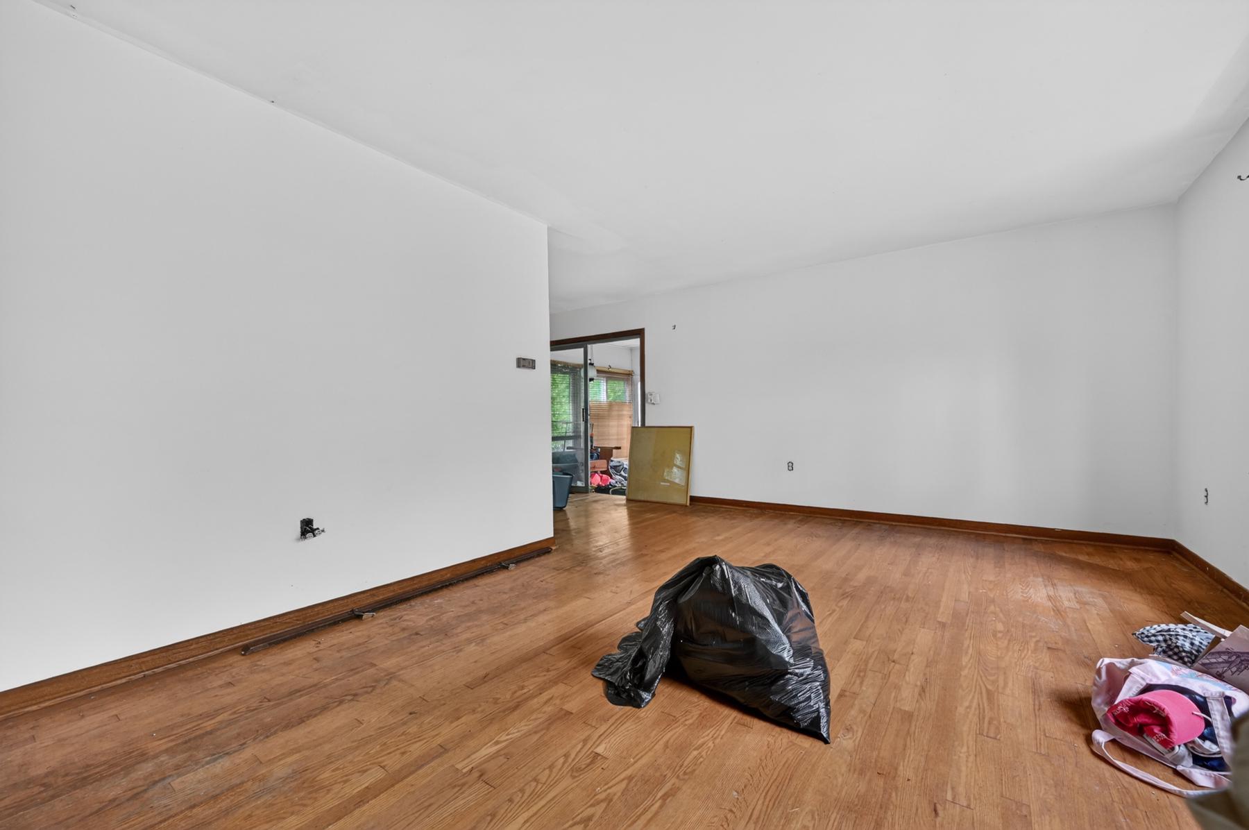 54 Decatur Avenue Annapolis, MD 21403 - Photo 8 of 63 a room with a hardwood floor and a ceiling fan