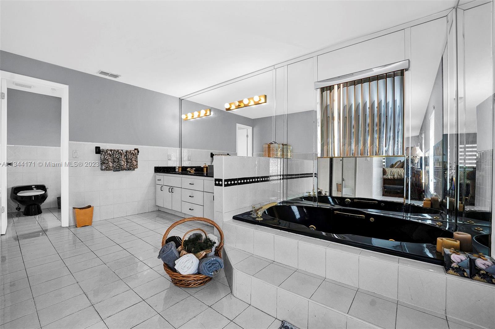 20100 Red Run Drive Hialeah, FL 33015 - Photo 15 of 61 a kitchen with a sink and cabinets