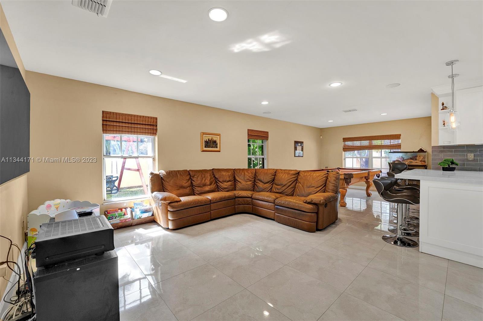 20100 Red Run Drive Hialeah, FL 33015 - Photo 33 of 61 a living room with furniture and a window