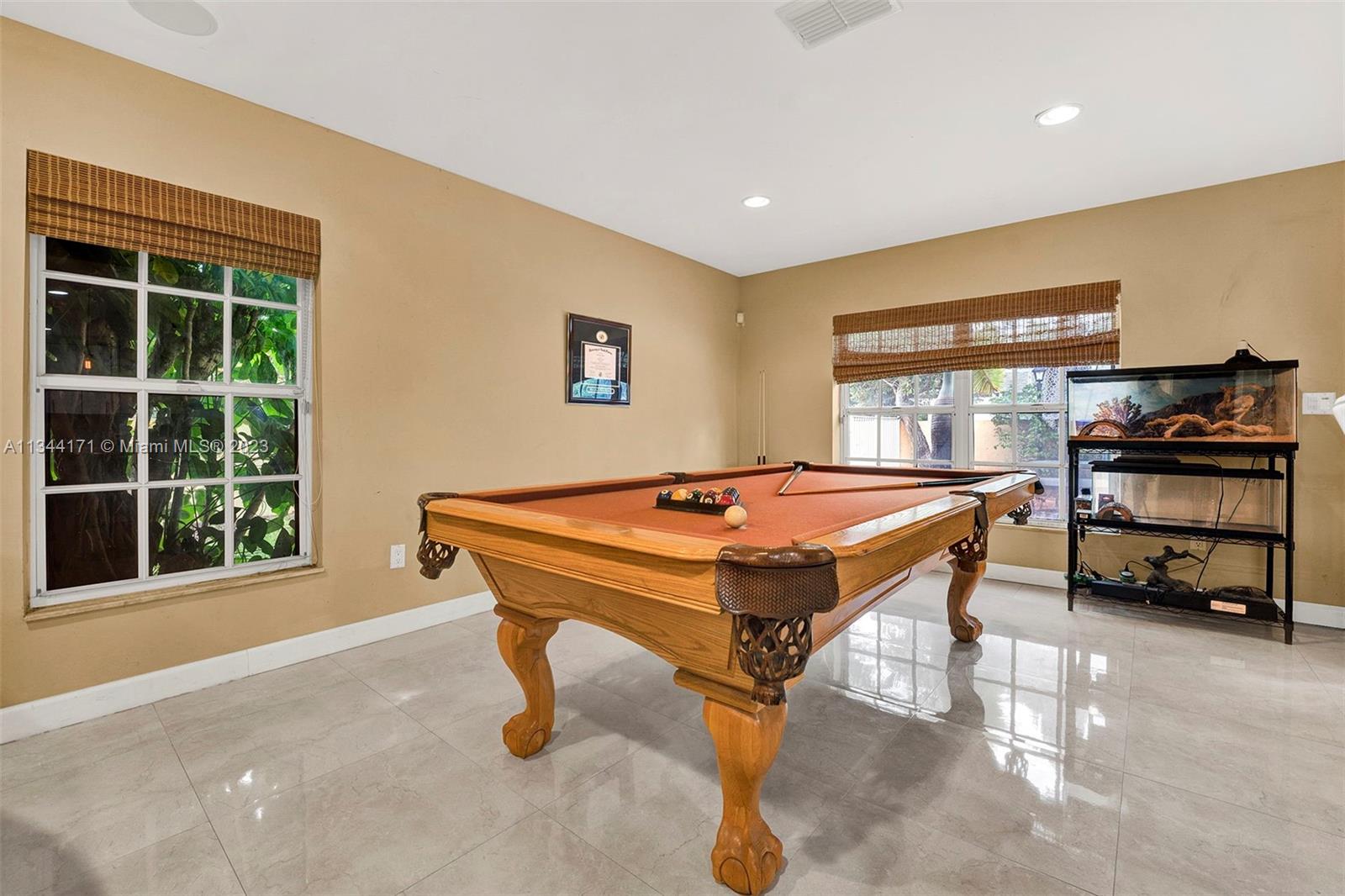 20100 Red Run Drive Hialeah, FL 33015 - Photo 34 of 61 a room with pool table and windows