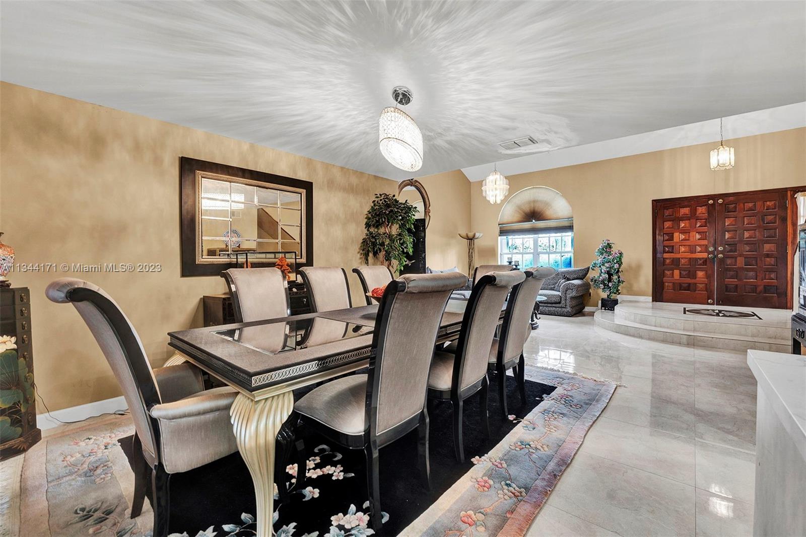 20100 Red Run Drive Hialeah, FL 33015 - Photo 39 of 61 a view of a dining room with furniture