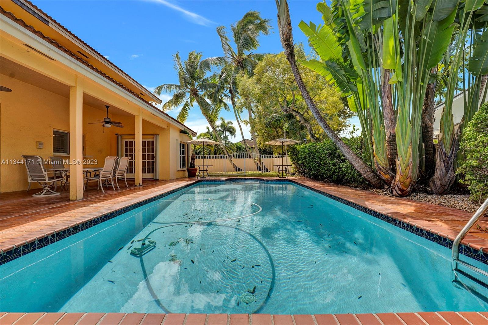 20100 Red Run Drive Hialeah, FL 33015 - Photo 47 of 61 a view of a backyard with swimming pool