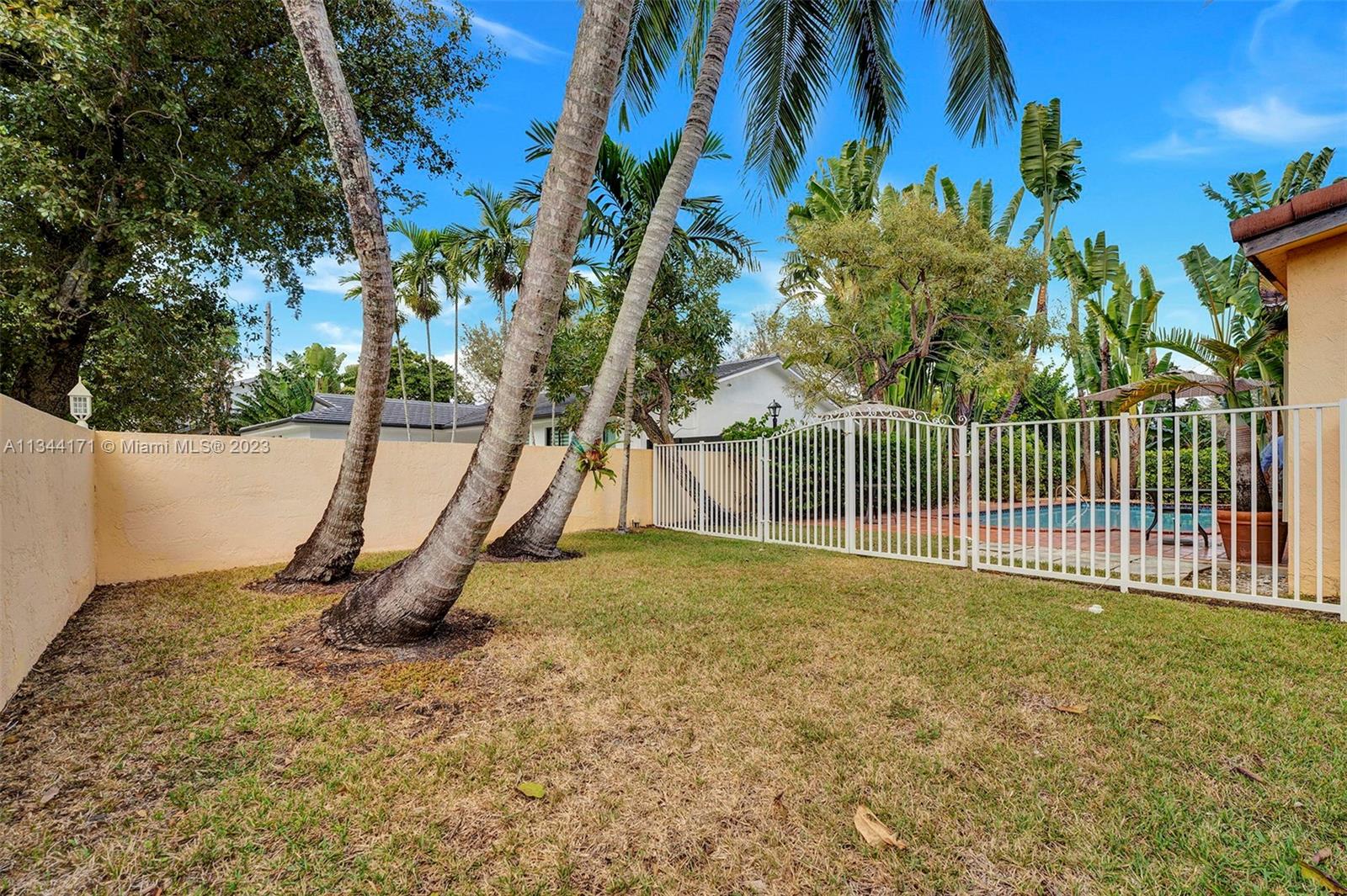 20100 Red Run Drive Hialeah, FL 33015 - Photo 50 of 61 a view of a yard with a tree