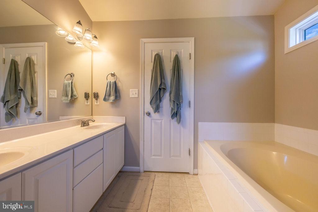 8896 Mullen Road King George, VA 22485 - Photo 22 of 48 Serene bathroom with modern elegance.