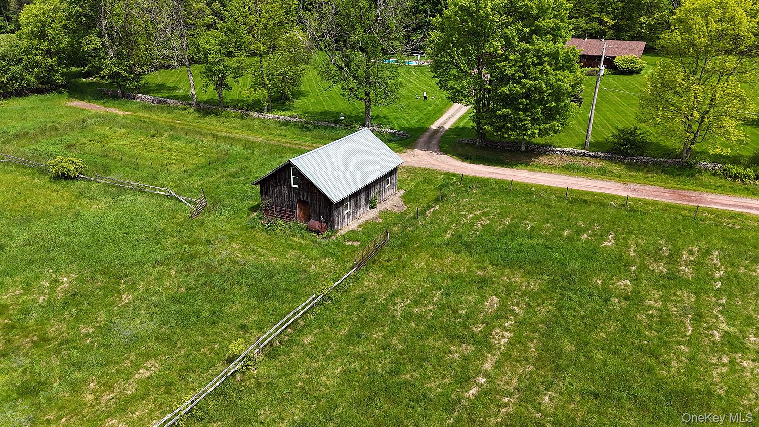 Menges Road Livingston Manor, NY 12791 - Photo 21 of 32 a view of a house with a yard