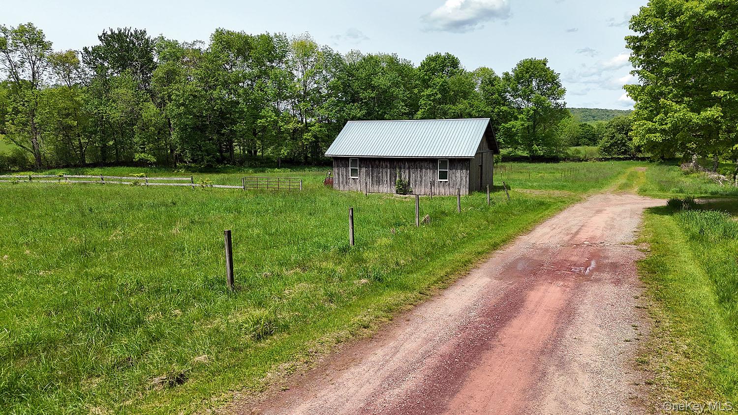 Menges Road Livingston Manor, NY 12791 - Photo 30 of 32 a view of a house with a backyard