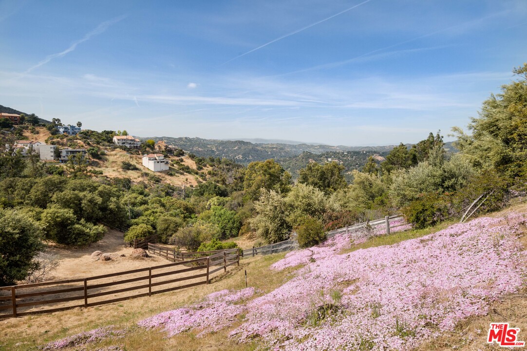 20333 Reigate Road Topanga, CA 90290 - Photo 17 of 21 an aerial view of a house with a yard